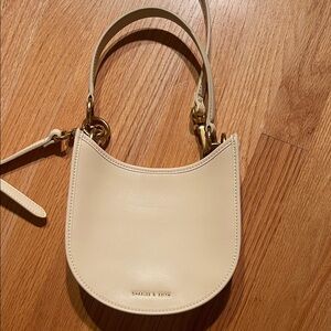 Charles & Keith Cream Crescent Shoulder Bag with Gold Hardware